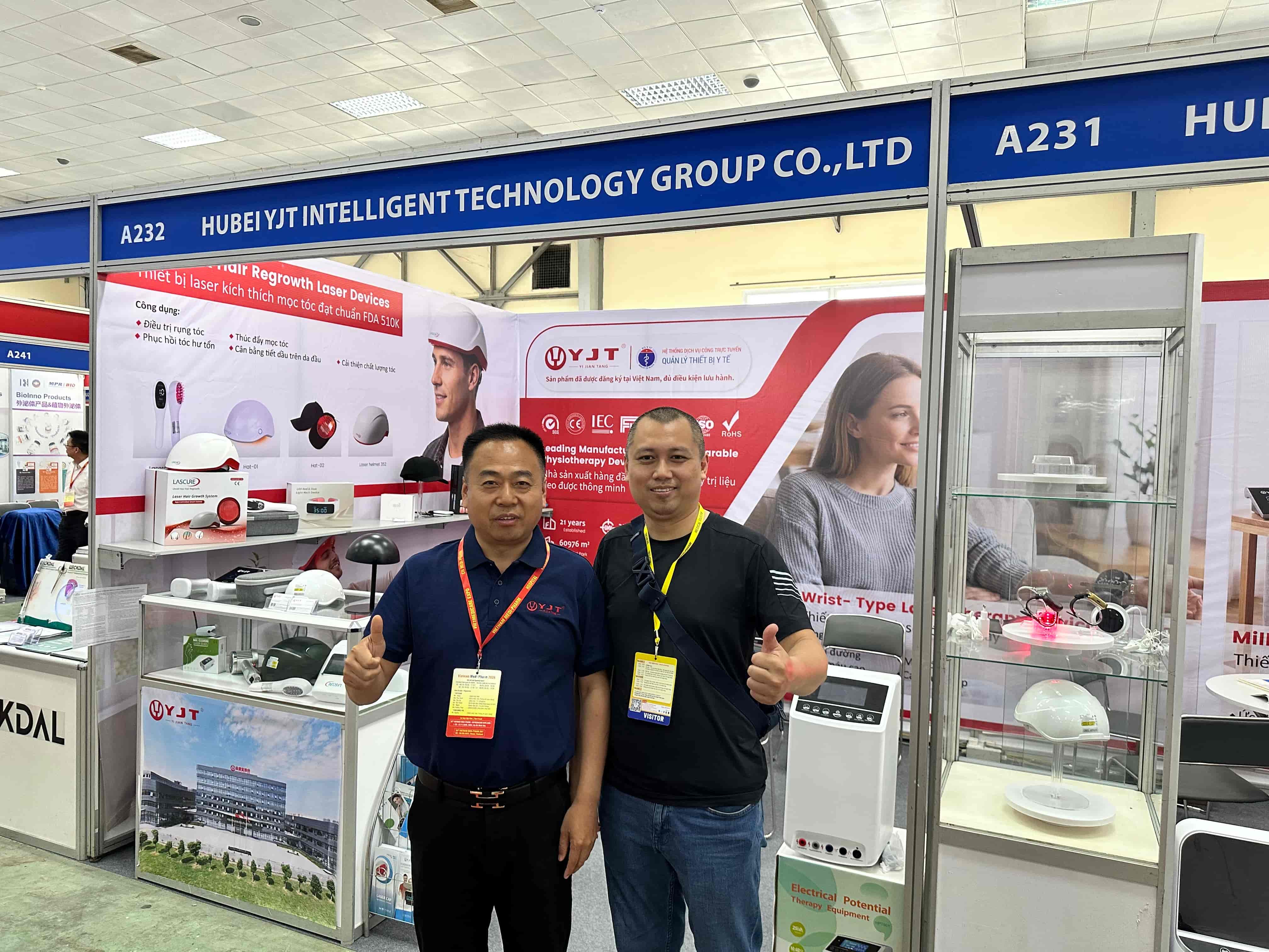 YJT Medical team consulting visitors on devices